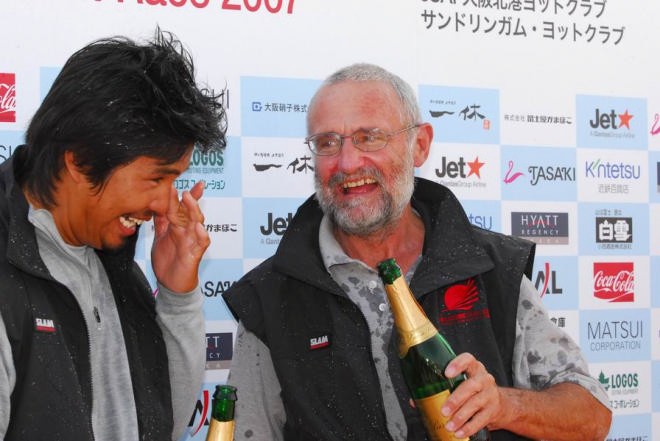 Makoto Hisamatsu and Jimmi Doherty laugh as they spray each other with welcome champagne. Photo: Tak Yamakazi - Kazi. 2007 Melbourne Osaka Cup © Melbourne Osaka Cup